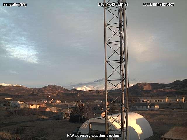 Mount Veniaminof with ashy eruption plume, March 4, 2021. Photo from the FAA Perryville NW webcamera. 