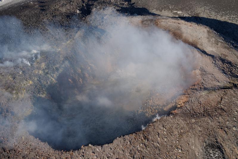 Photos of the May 25, 2021 explosion crater on Great Sitkin, taken during an overflight on June 11.