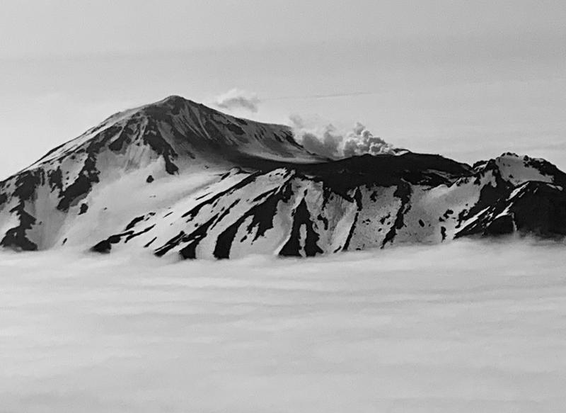 Great Sitkin steaming photographed by Simon Kline on the Cold Bay to Adak flight on July 14, 2021.