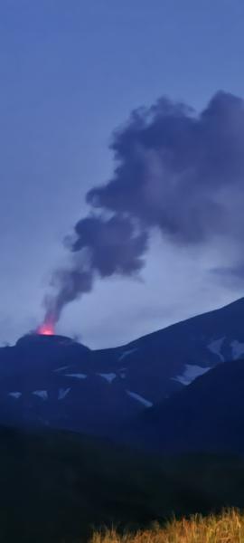 Great Sitkin steaming and incandescence above lava dome, captured by Peggy Kruse on August 5, 2021