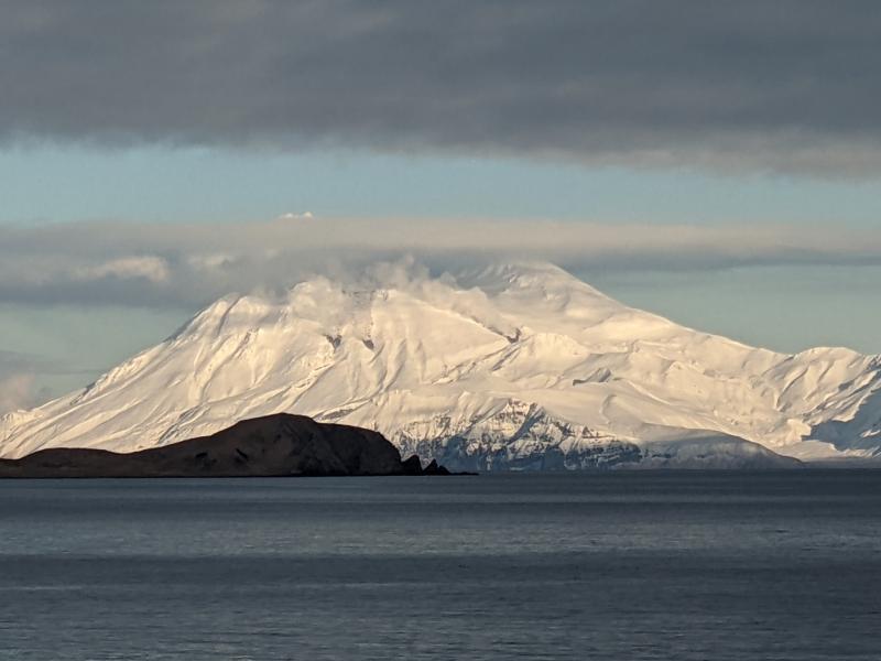 Steam and lava flows at Great Sitkin, photographed from Adak by Sarah Welter on January 14, 2022.