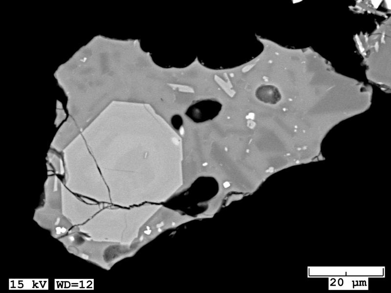 BSE images of glassy mafic scoria with slightly to moderately microlitic glass and rounded vesicles collected from the March 8, 2017 eruption at Bogoslof. 