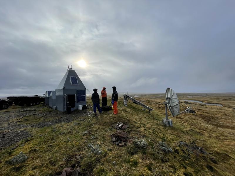 AVO staff enjoy a break in the clouds while working at the telemetry hub on Amchitka Island in the far western Aleutians.