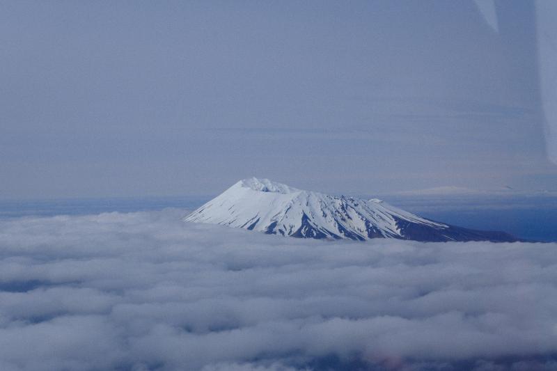 Aerial view of Herbert Island volcano. Yunaska Island is visible in the background.