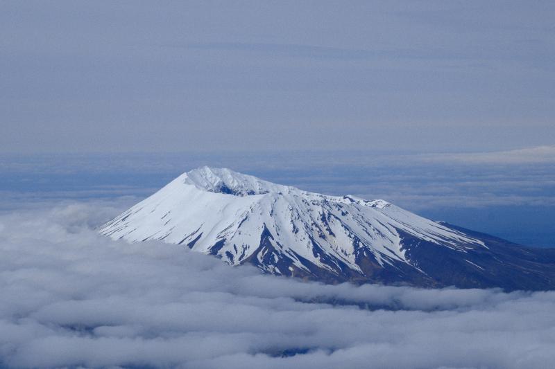 A scenic view of Herbert Island volcano, taken on a helicopter fly-by of Cleveland Volcano on June 1, 2023.