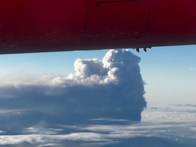 Shishaldin Volcano eruption plume, ~8:45 am August 4, 2023. Photo taken on a flight from Anchorage to Dutch Harbor, courtesy of David Ravenscroft.