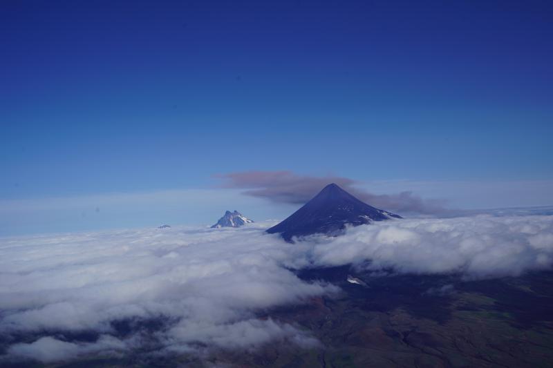 Rim collapse event on the NE flank of Shishaldin Volcano, viewed from helicopter circuit on upwind side of mountain.  Some fumarolic activity can also be seen in the notch on the SW edge of the crater rim.