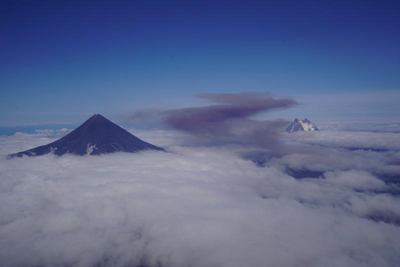 Rim collapse event on the NE flank of Shishaldin Volcano, viewed from helicopter circuit on upwind side of mountain.  Some fumarolic activity can also be seen in the notch on the SW edge of the crater rim.