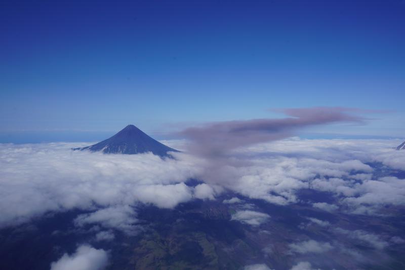 Rim collapse event on the NE flank of Shishaldin Volcano, viewed from helicopter circuit on upwind side of mountain.  Some fumarolic activity can also be seen in the notch on the SW edge of the crater rim.