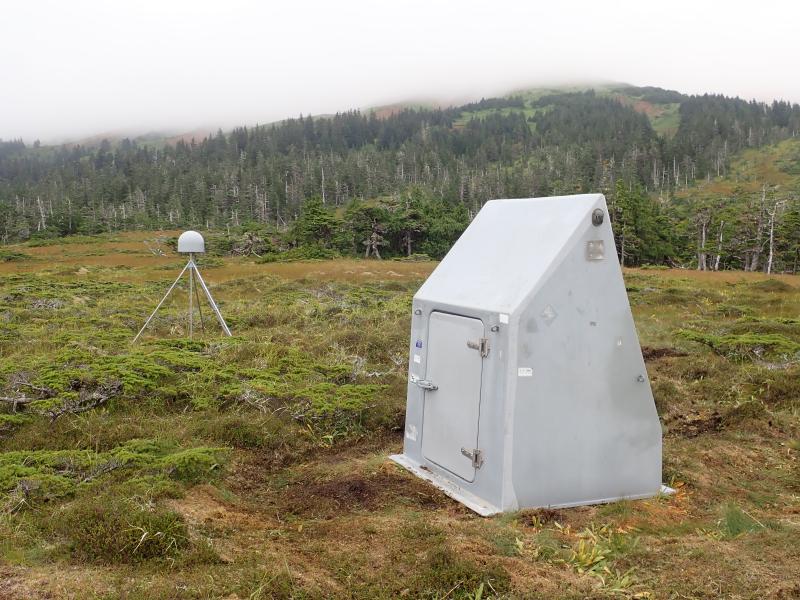 Installation of AVO&#039;s new seismic and GNSS network at Mt. Edgecumbe volcano, August 20-29 2023.  EDNW is an autonomously powered seismic and GNSS station.  GNSS antenna monument at site EDNW made of 12 ft by 1&quot; stainless steel rods driven 7 ft into the muskeg, and welded together at the top.