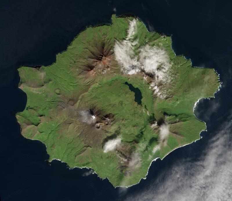 Satellite image of Semisopochnoi Island in the Rat Islands, Alaska, on September 10,
2018, showing active and recently active volcanic features. The north cone of Mount Young is steaming in this image, with a light dusting of gray ash visible on the west flank of the cone. Image taken by Sentinel-2.