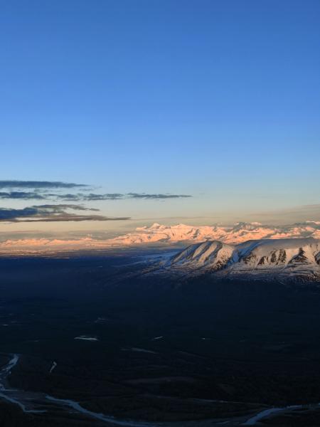 A scenic view of Mount Spurr (the prominent peak on the middle horizon) with Mount Susitna in the foreground. Taken from an Alaska Airlines flight from Fairbanks to Anchorage.