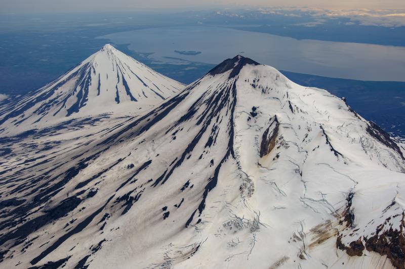 West flank of Pavlof Volcano with Pavlof Sister in the background viewed during an overflight on July 23, 2024.