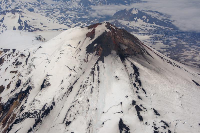 Southeast flank of Pavlof Volcano viewed during an overflight on July 23, 2024. The 2021 eruption vent is visible.