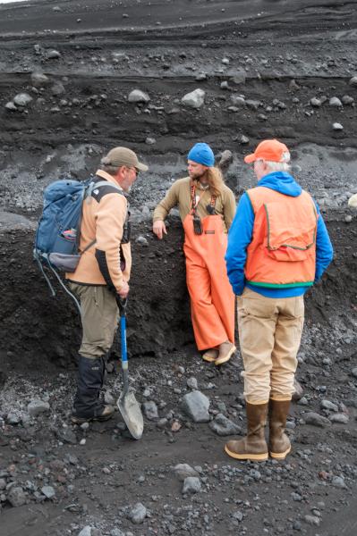 AVO geologists (from left to right) Pavel Izbekov, Jordan Lubbers, and Chris Waythomas, discussing a lahar deposit on the north flank of Shishaldin.