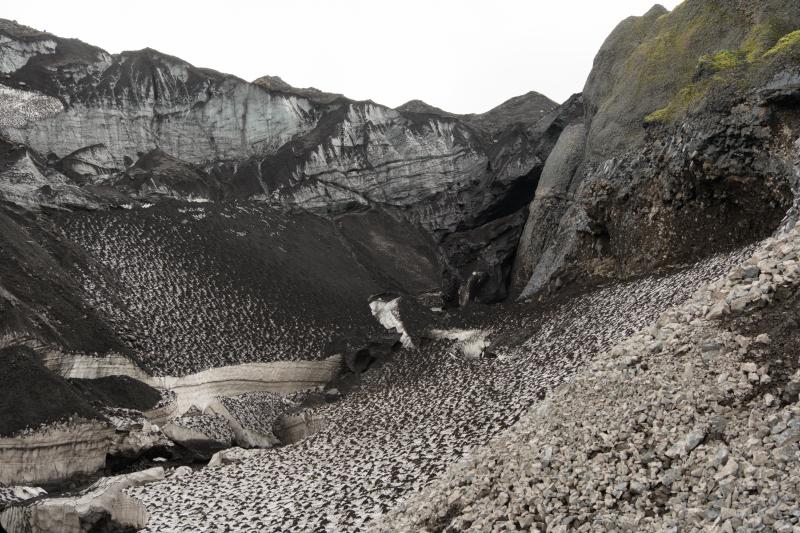 Outflow location of many lahars generated from pyroclastic deposits melting glacial ice during the 2023 Shishaldin eruption. An older Shishaldin Pleistocene ice-marginal lava is visible on the right side of the image.