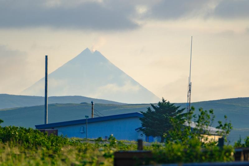 Light steam emissions visible from the notched summit of Shishaldin Volcano viewed on an exceptionally clear evening from Cold Bay, Alaska.