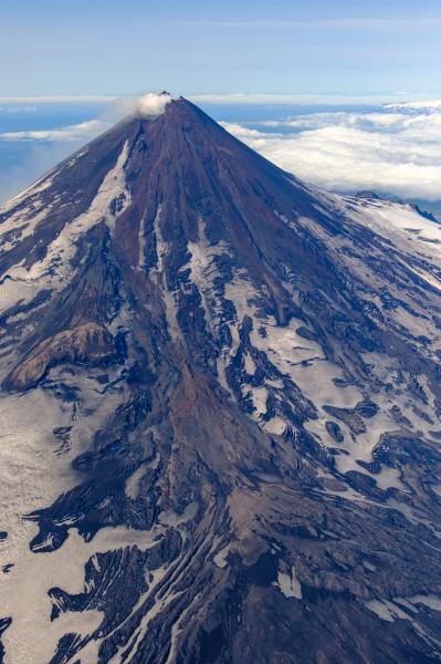 The northeast flank of Shishaldin Volcano viewed during a gas and structure-from-motion survey on July 30, 2024. Pyroclastic flow deposit fans from the 2023 eruption form light colored outcrops (center bottom of image).