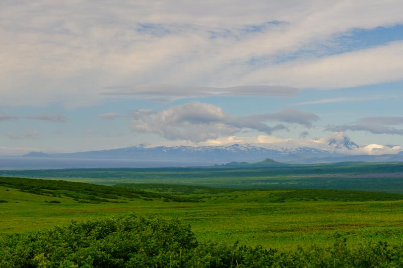 Westdahl volcano on the horizon viewed from the south flank of Isanotksi Peaks. 