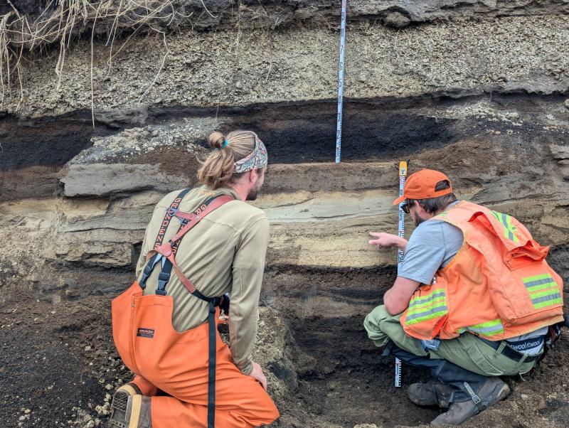 AVO geologists examine a coastal exposure at Lapin Cape, north of Shishaldin Volcano, during the 2024 summer fieldwork on Unimak Island.