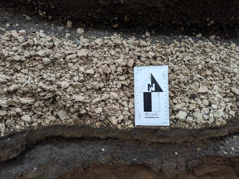 Basal tephra fall deposit from the Fisher caldera-forming eruption exposed on the northern flank of Shishaldin Volcano, at the ocean bluff of Cape Lapin. Sampled as 24IPE1A during the 2024 AVO fieldwork on Unimak Island.