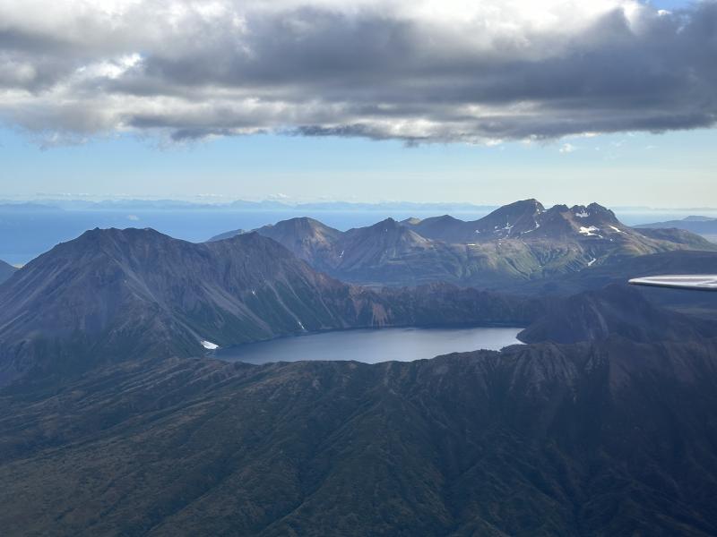 An aerial view of Kaguyak Crater including its caldera lake. 
