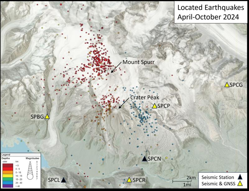 Located earthquakes near Mount Spurr, Alaska, April through October 8, 2024. Earthquake locations are colored by depth, with shallow earthquakes appearing red and deeper earthquakes are blue. Larger dots indicate higher magnitude earthquakes; the largest earthquake on this figure is a M2.3. Triangles indicate the locations of AVO&#039;s monitoring sites, colored by equipment at the specific site. Black triangle denote a location of a seismometer, and yellow triangles mark sites with co-located seismometers and GNSS. GNSS stands for Global Navigation Satellite System receiving sites that use signals from the Global Positioning System and other satellite constellations to precisely measure the position on the Earth in three dimensions (north-south, east-west, and vertical).