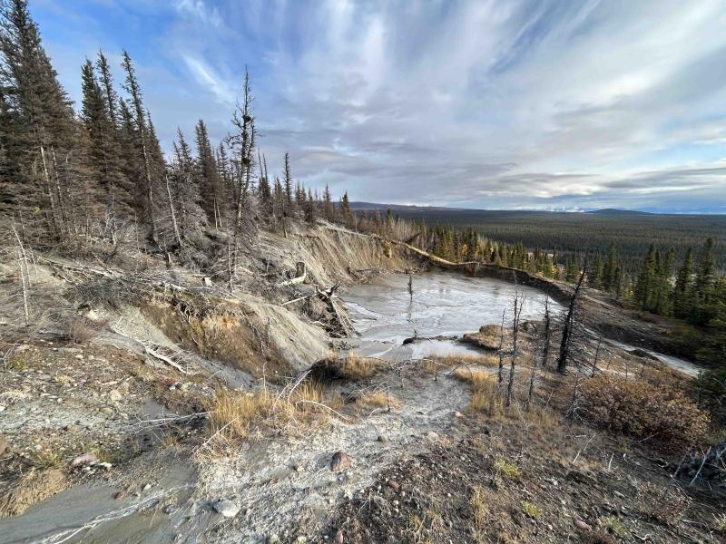 Shrub mud volcano, view to the southeast, September 26, 2024. Upper Klawasi mud volcano, 7.7 km (4.8 mi) to the south, can be seen in the distance. Photo by Mitch Mitchell, AVO/DGGS.