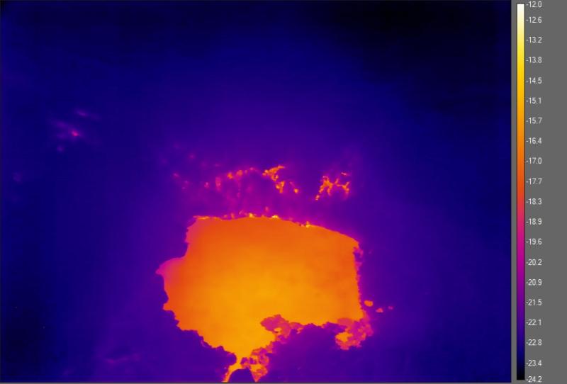 Thermal infrared movie from a helicopter overflight of the summit crater lake at Mount Spurr. The lake has a relatively warm water surface on one side, but snow and ice covering the eastern and southern sides. Warm features on the crater wall above the lake are fumaroles (steam vents). Imaging through a very cold cloud precludes exact temperature measurements, unfortunately, but the fumaroles are warm enough to stay snow-free and prevent the water in the lake from freezing. Note: this video has no sound.
