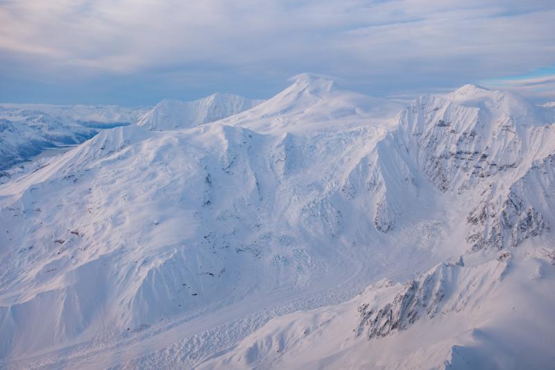 Mount Spurr from a helicopter approaching from the east prior to a gas survey on December 18, 2024.