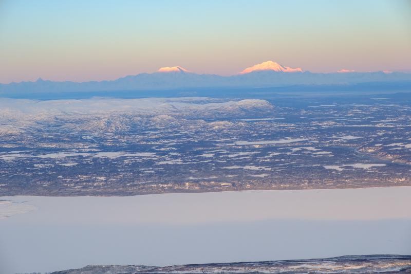 Just before sunset on Denali and the high peaks of the Alaska Range on December 18, 2024. Taken while returning from Anchorage after a Spurr gas and photo survey.