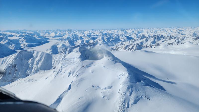 View of Mount Spurr summit, taken March 21, 2025, from the east. Steam is rising from the fumaroles on the shore of the lake inside the summit crater and on the upper flanks.