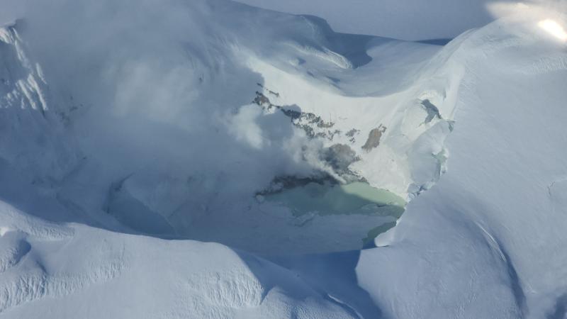 View of Mount Spurr summit crater lake, taken March 21, 2025. Steam is rising from the fumaroles on the shore of the lake inside the summit crater and on the upper flanks.