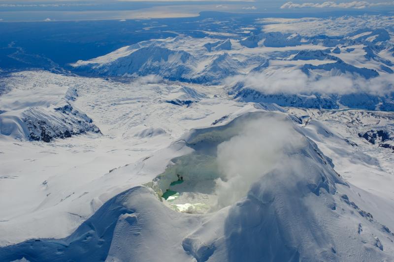 Mount Spurr summit and crater lake from and April 25 overflight and gas survey. View is looking southeast. 