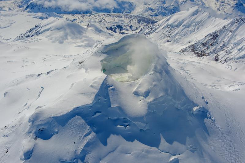 Mount Spurr summit and crater lake with Crater Peak in the upper left of the photo from and April 25 overflight and gas survey. View is looking south. 