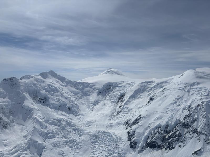 Mount Spurr steam and gas plume viewed from the northeast above the Capps Glacier.