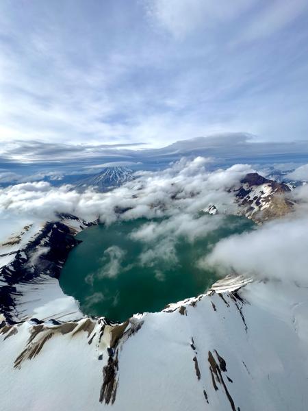 Aerial view of the crater lake at Mount Katmai with Mount Mageik in the background.
