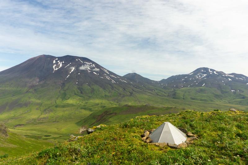 Korovin (left) and Kliuchef (right) volcanoes in the Atka Volcanic Complex viewed from station KOWE. Infrasound sensor is located in the foreground. 