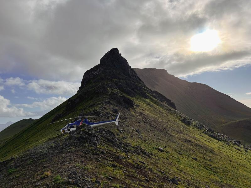 Helicopter near site 25AAMC037, southwest of Kliuchef volcano. Photo taken during field work at Atka volcanic complex, northern Atka Island. 