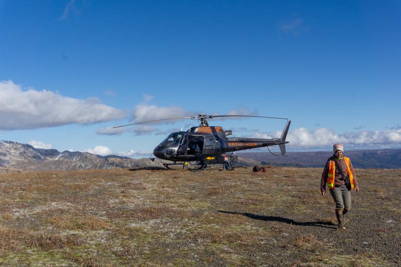 AVO Geologist K. Wallace on her way to do some tephra sampling just south of Mount Spurr. 