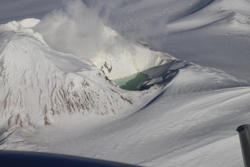 Summit crater lake and plume at Martin.