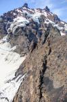 Vertical dike radiating outward from the summit of Isanotski Peaks, following a ridge on the east-northeast flank 