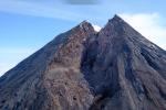 The southwest side of the summit cone of Shishaldin Volcano viewed during a gas and structure-from-motion survey on July 30, 2024. The sharp notch in the summit crater formed during the 2023 eruption.