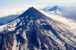 The southwest flank  of Shishaldin Volcano viewed during a gas and structure-from-motion survey on July 30, 2024. Isanotski and Roundtop volcanoes are visible in the background. 