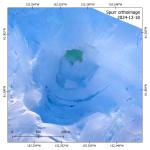 Orthoimage of the summit crater of Mount Spurr derived from a structure-from-motion reconstruction of oblique air photos collected during an AVO overflight on December 18, 2024.The lake surface within the crater is more than 80% covered by ice and snow, with some floating pieces of yellow sulfur. The lake surface undercuts the intracrater glacier, which has been slowly collapsing into the lake since it formed in May-June 2024. The lake surface is about 10 meters (30 ft) higher in this survey than one done on June 23, 2024. 