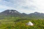 Korovin (left) and Kliuchef (right) volcanoes in the Atka Volcanic Complex viewed from station KOWE. Infrasound sensor is located in the foreground. 